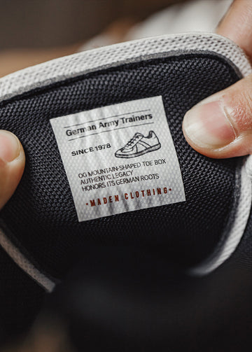 running shoes with heritage tongue label