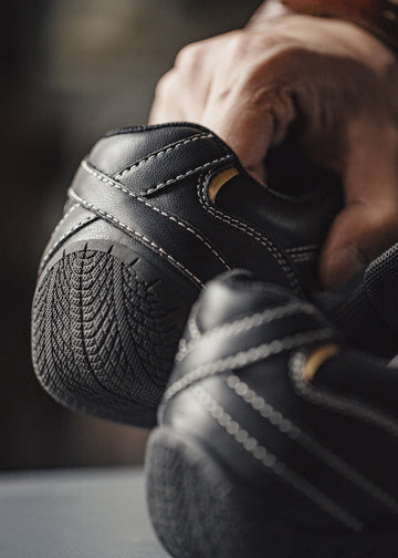 racing-inspired rubber outsole with textured grip