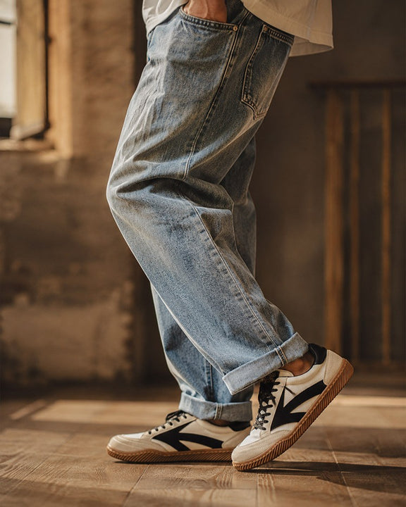 Hector Maden retro sneakers worn with relaxed blue denim